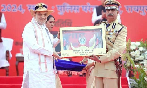 Union Home Minister Amit Shah presents ‘President’s Colour’ to the Chhattisgarh Police in Raipur